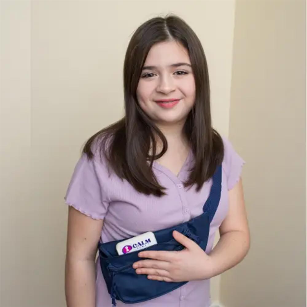 Calm PEMF - PEMF Device being worn in small bag 
