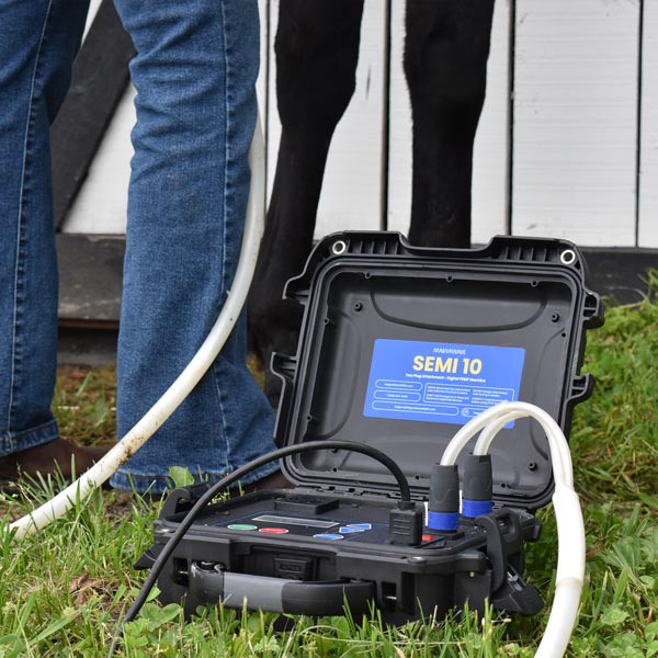 Semi 10 PEMF device from Magnawave being used on horse from floor